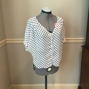 White & black polka dot blouse
